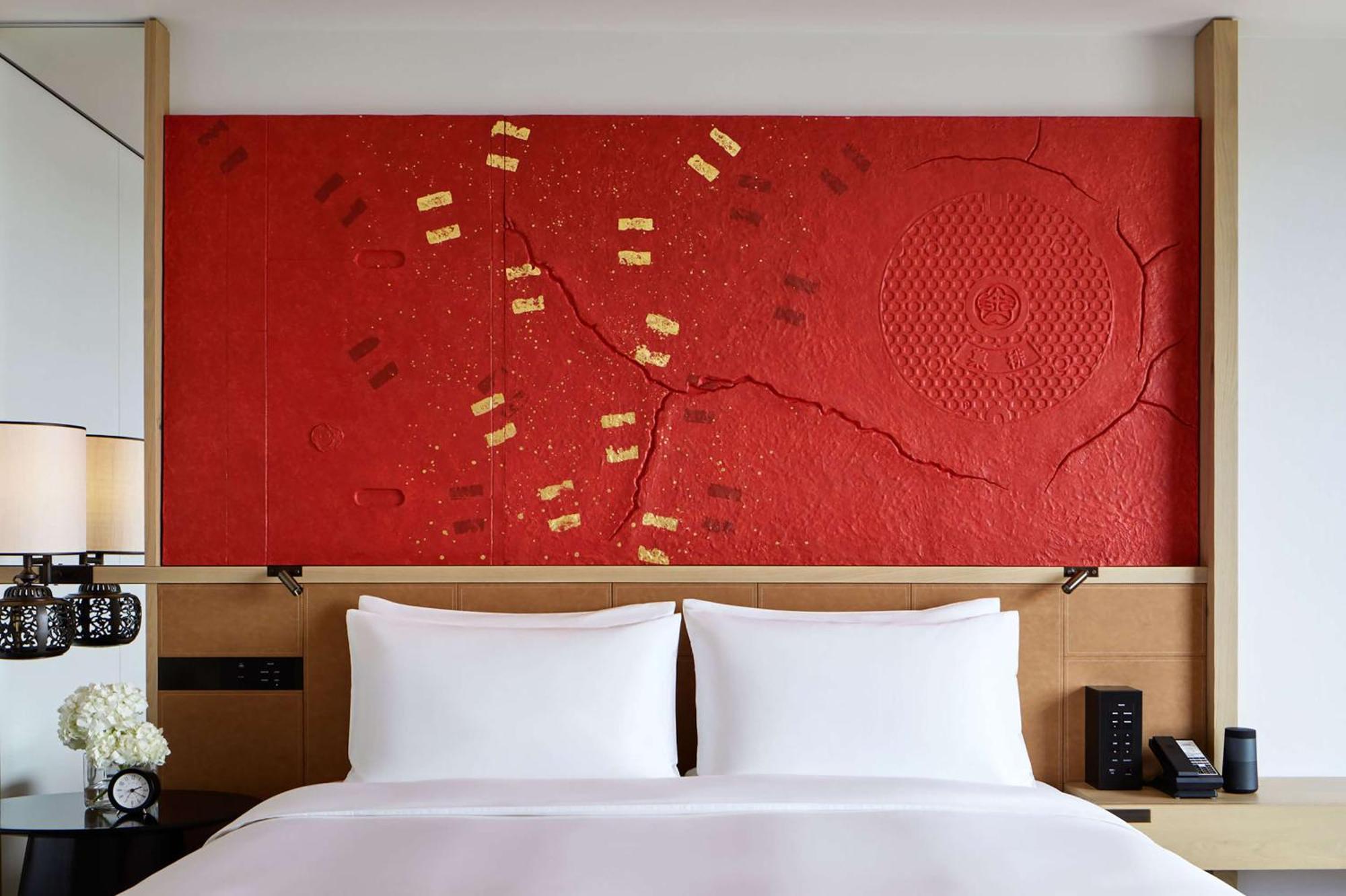 Hyatt Centric Kanazava Kültér fotó A bed with a headboard